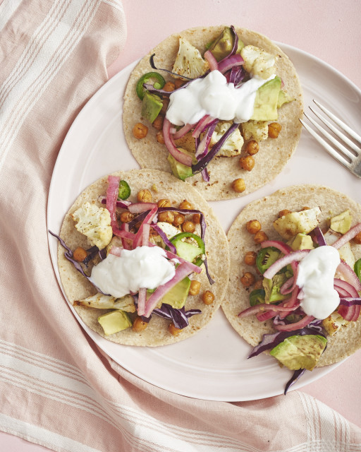 Plated Roasted Cauliflower and Chickpea Tacos with Lime Crema